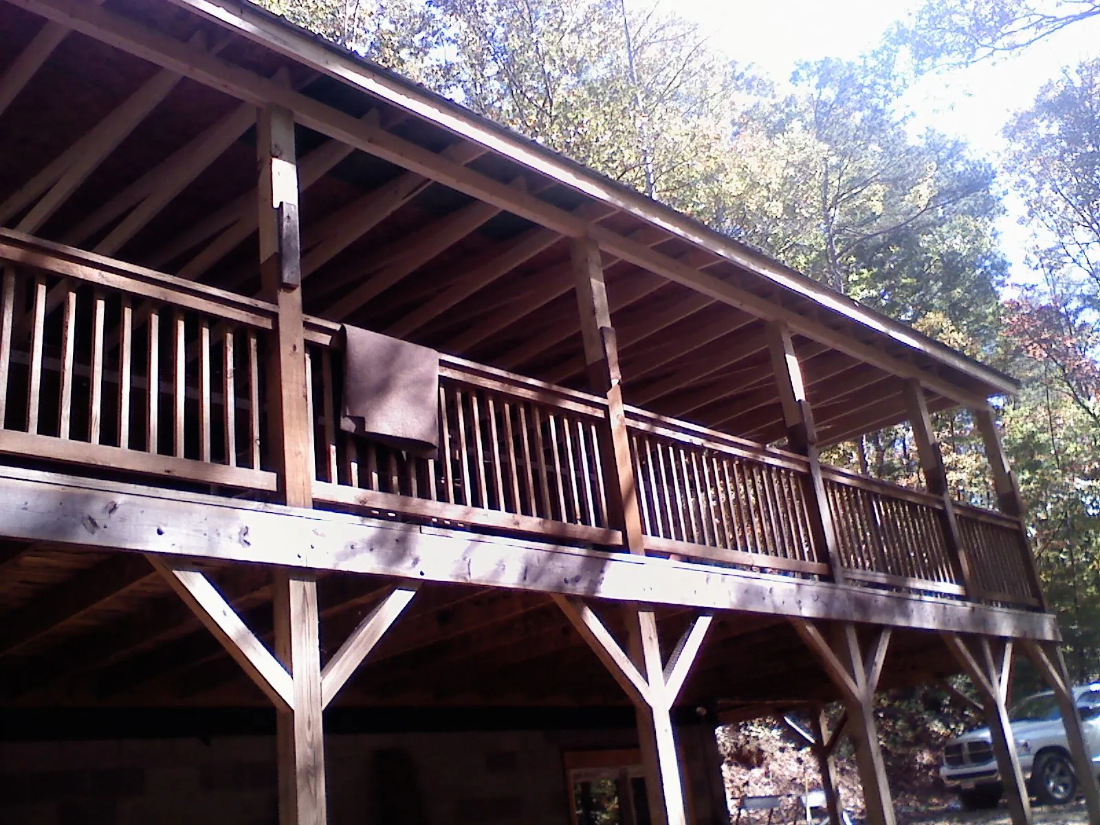 Timber framing under a new elevated porch and deck — Roof Leak Repair in Schellsburg by Roofing Brothers
